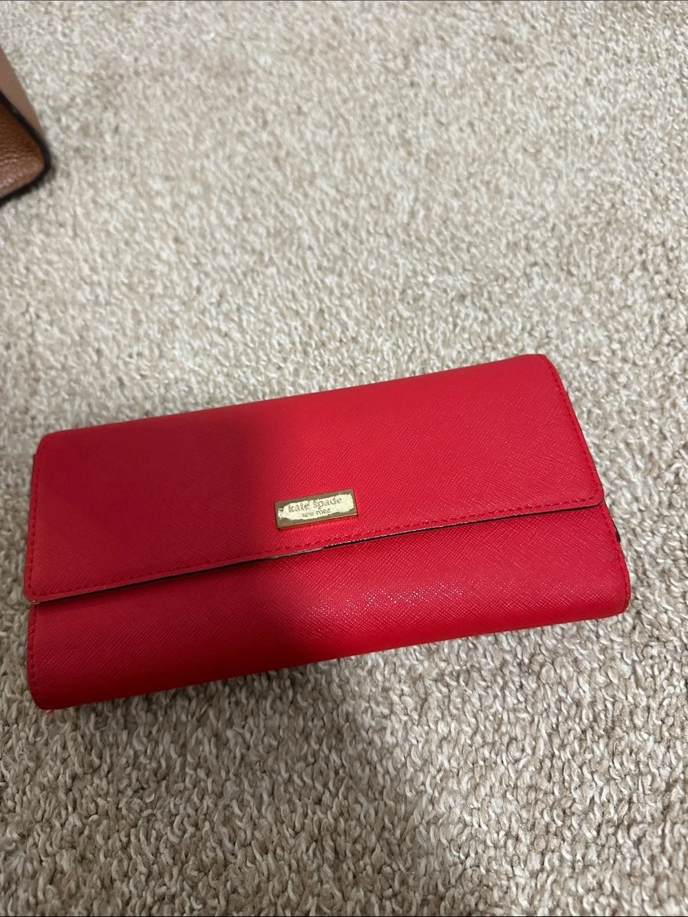 kate spade Hayes street Brown Leather Tassel Satchel with Red Lining